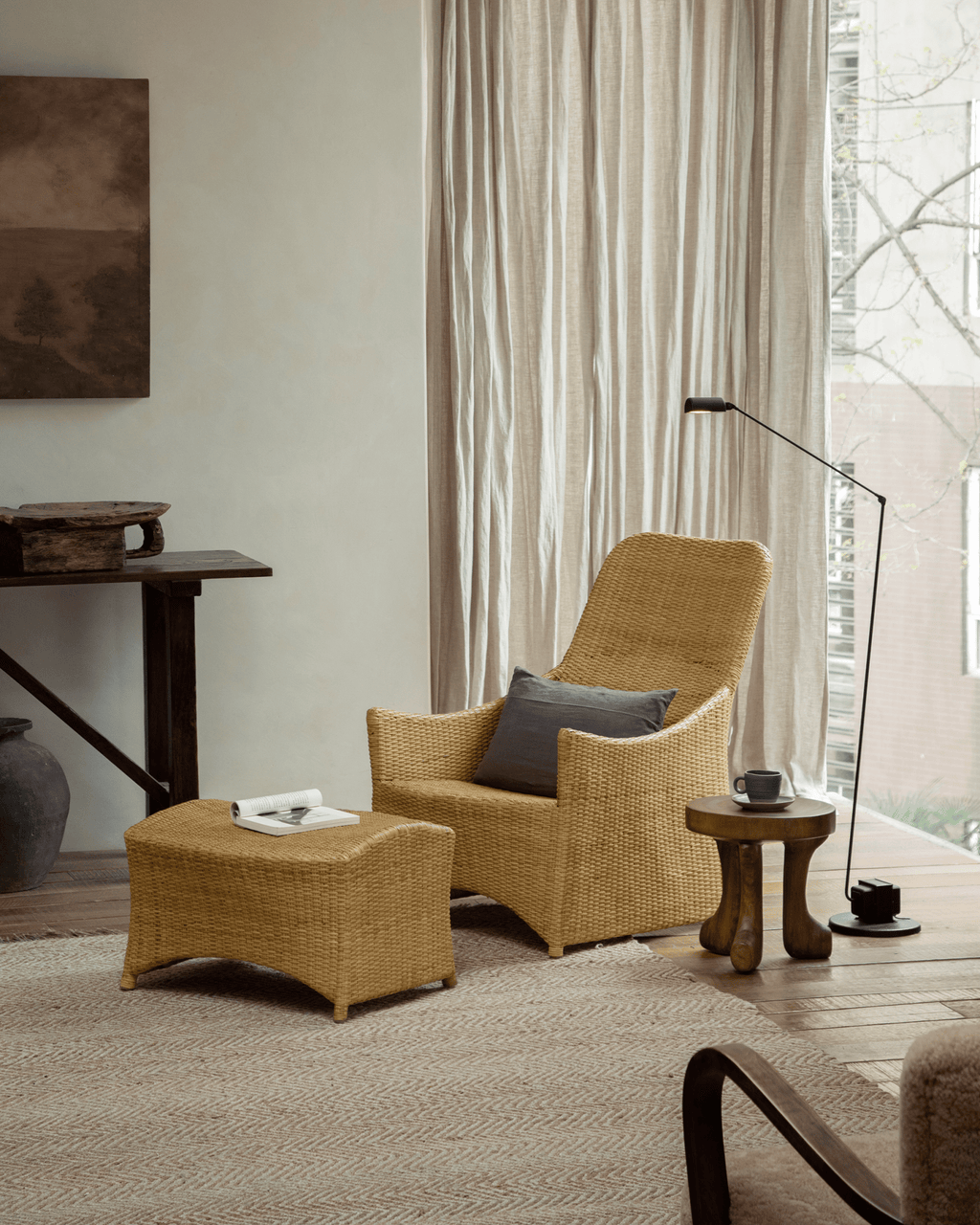 Fauteuil lounge coulissant en rotin