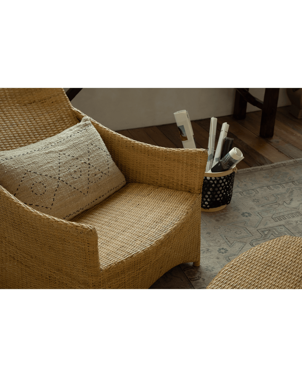Fauteuil lounge coulissant en rotin