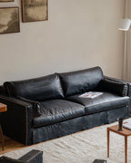Canapé en cuir à jupe