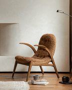Fauteuil lounge Arc en peau de mouton retournée