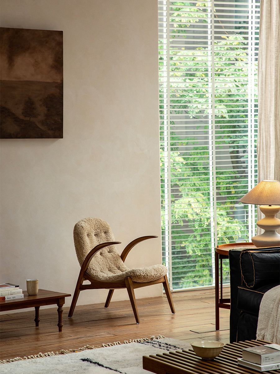 Fauteuil lounge Arc en peau de mouton retournée