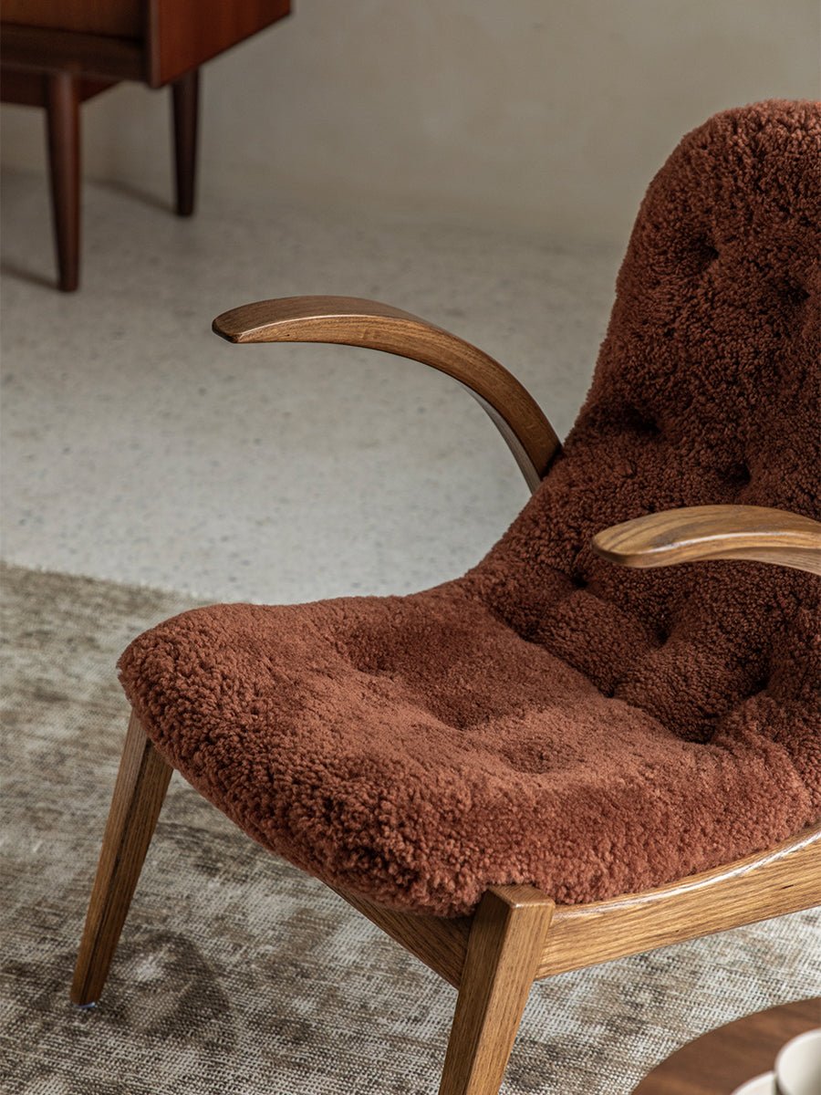 Fauteuil lounge Arc en peau de mouton retournée