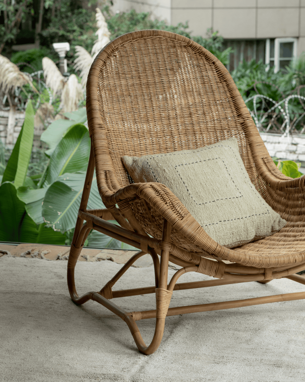 Fauteuil lounge en rotin Buffier