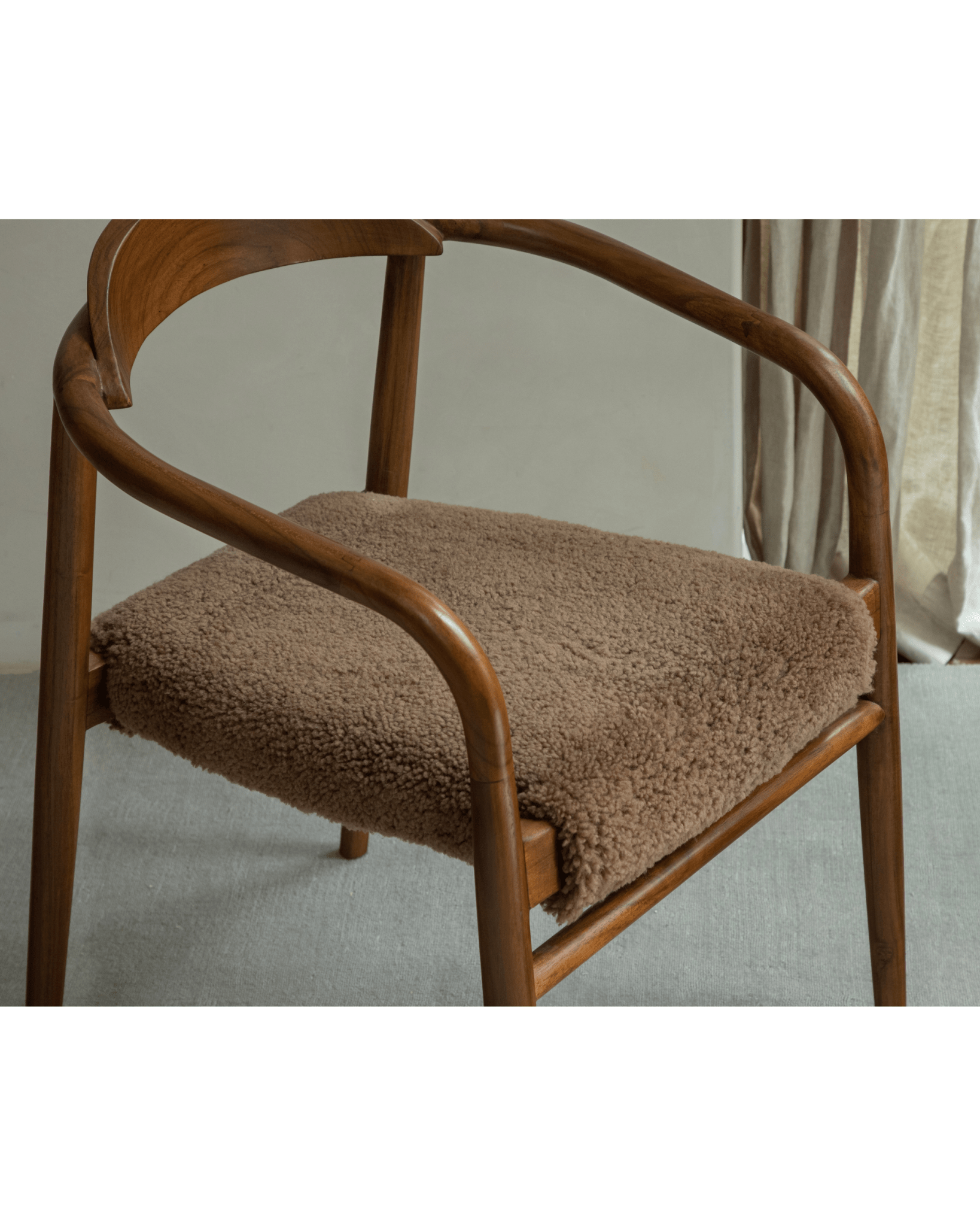Fauteuil en peau de mouton Crescent