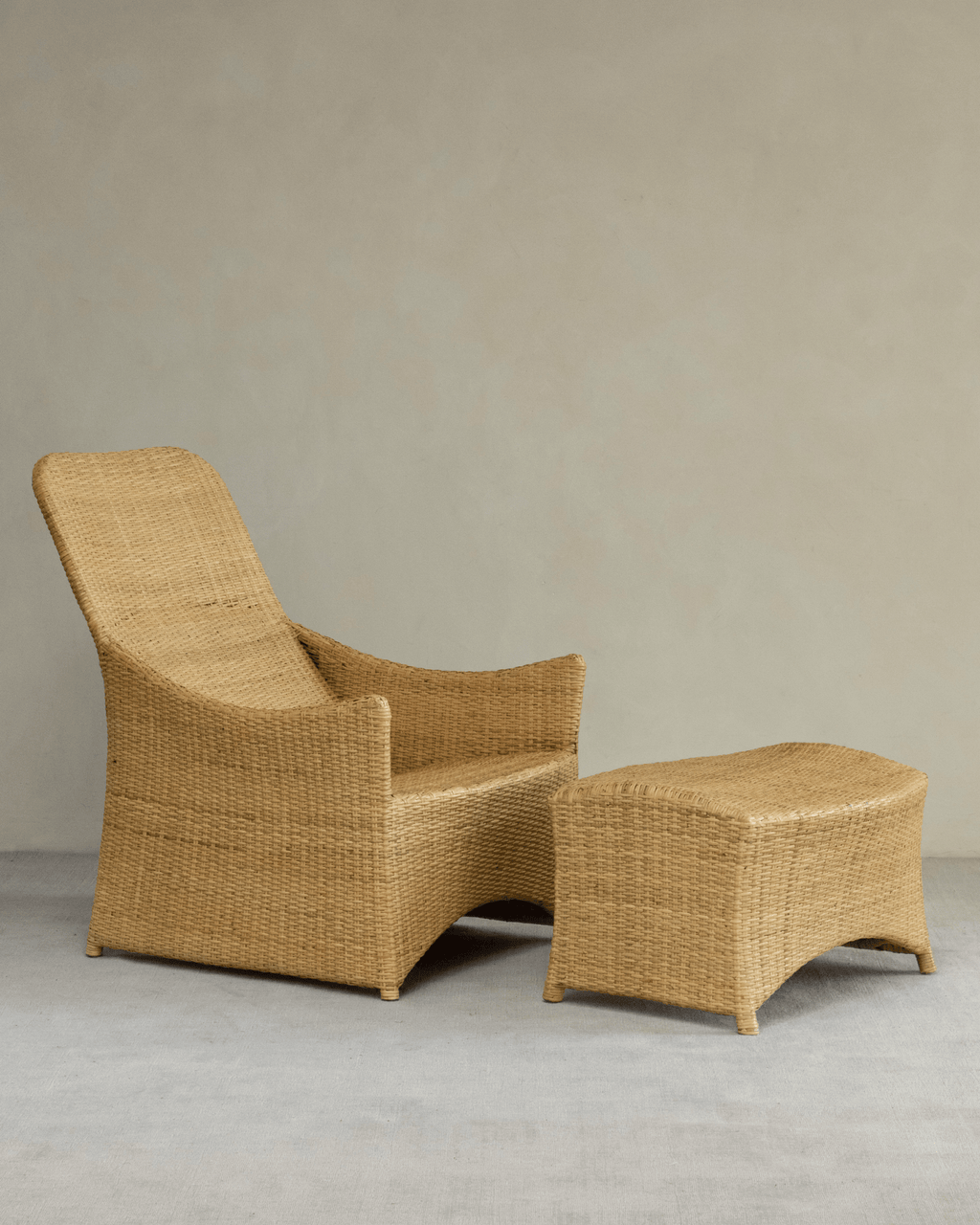 Fauteuil lounge coulissant en rotin