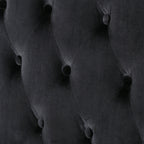 Canapé à oreilles hautes capitonné en velours noir