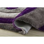 Tapis à poils longs Mateos au design abstrait