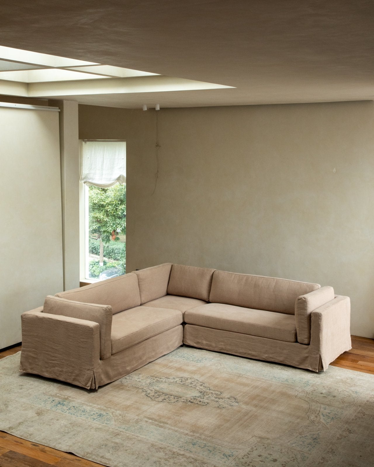 Canapé d'angle à jupe